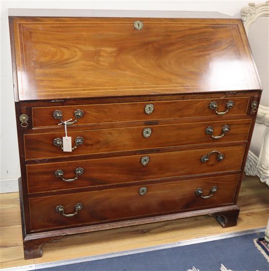 A George III inlaid mahogany bureau W.116cm